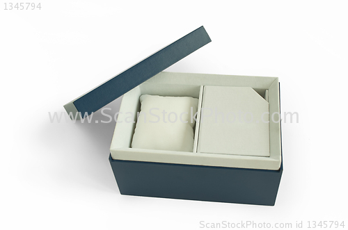 Image of Gift box with house inside