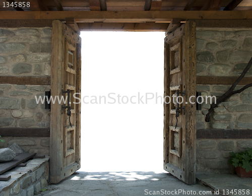 Image of Two opened old wooden dors