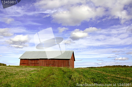 Image of Country landscape with red barn