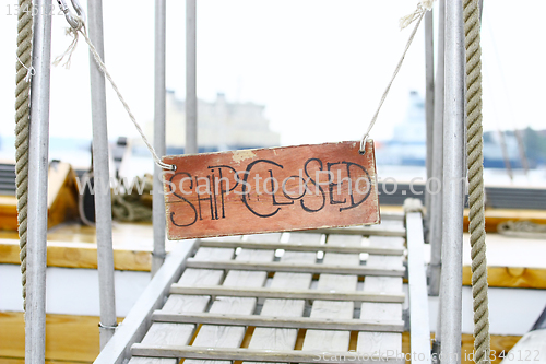 Image of Old wood notice board/Ship closed