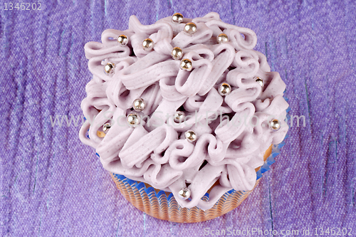 Image of Fancy light purple cupcake