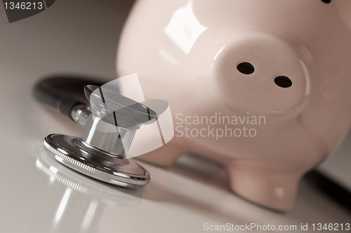 Image of Piggy Bank and Stethoscope with Selective Focus