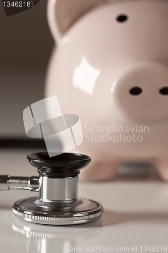 Image of Piggy Bank and Stethoscope with Selective Focus