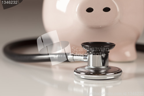 Image of Piggy Bank and Stethoscope with Selective Focus