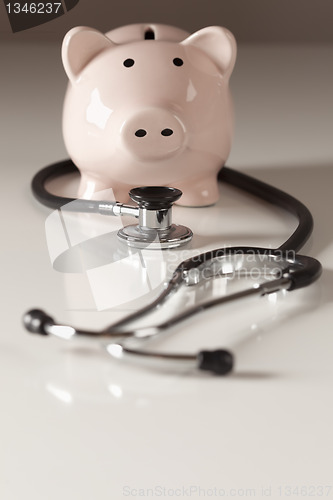 Image of Piggy Bank and Stethoscope with Selective Focus