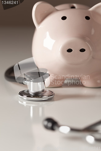 Image of Piggy Bank and Stethoscope with Selective Focus