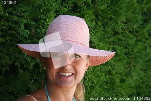 Image of Beautiful girl in pink hat