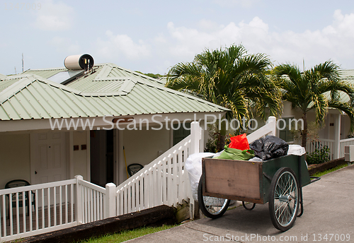 Image of Cleaning cart outside villa