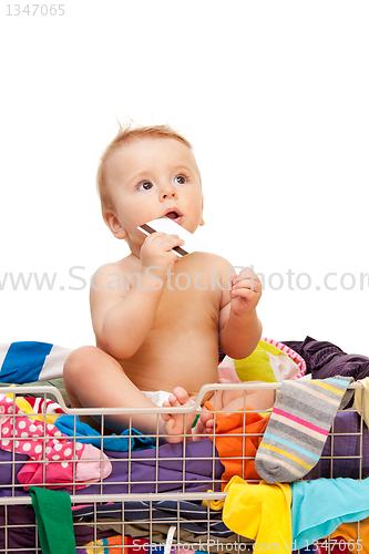 Image of Baby with clothes and credit card