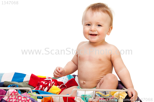 Image of Laughing baby with clothes