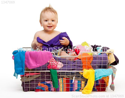 Image of Happy baby with clothes