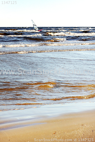 Image of sea and windsurfer