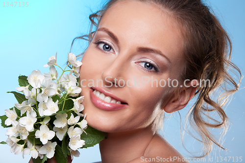 Image of Beauty portrait and jasmine  flowers