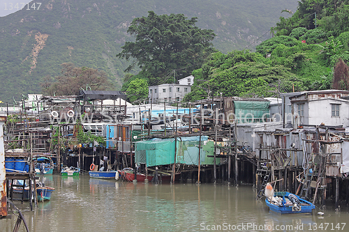 Image of famous wood house on water