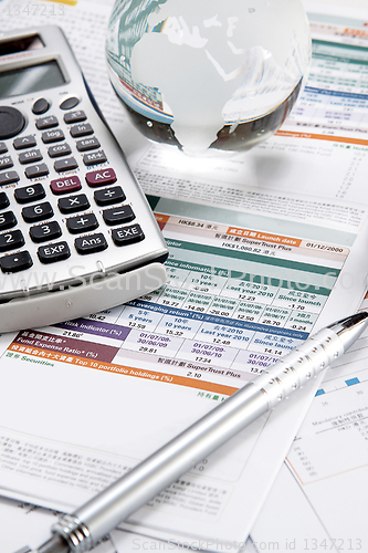 Image of financial charts and graphs on the table 