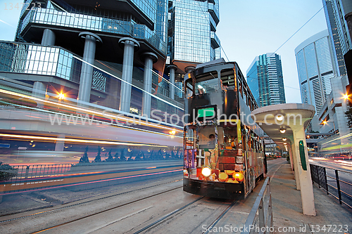 Image of Tram in traffic city
