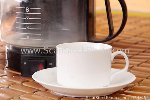 Image of coffee machine and cup 