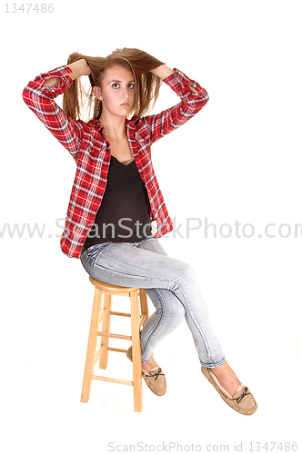 Image of Pretty girl sitting.