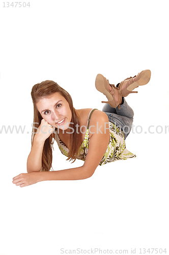 Image of Teenager lying on floor.