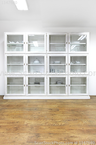 Image of White glass cabinet