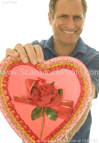 Image of selective focus Valentine candy box middle age man