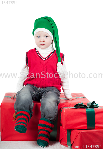 Image of Christmas toddler with presents