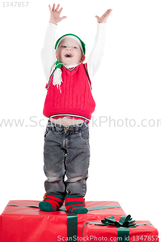 Image of Christmas toddler with presents
