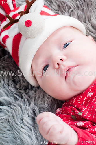 Image of Little cute baby in red