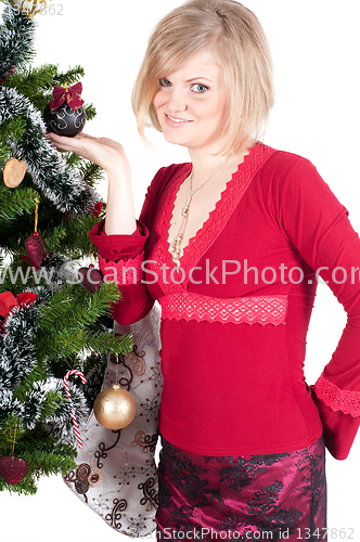 Image of Happy woman with Christmas presents