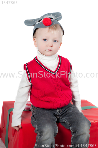 Image of Christmas toddler with presents