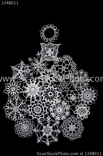 Image of christmas ball from white snowflakes