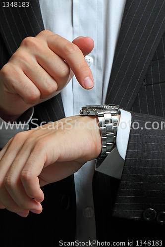 Image of men's hand with a watch. 