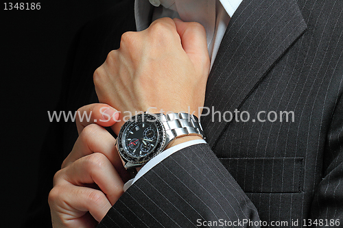 Image of men's hand with a watch. 