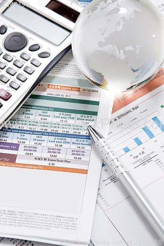 Image of financial charts and graphs on the table 