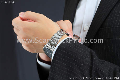 Image of men's hand with a watch. 