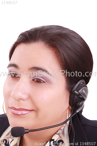 Image of Young beautiful girl in headset,sitting at the desk tired, isola