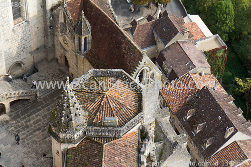 Image of Roofs of a church and some houses