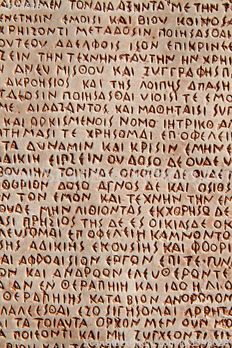 Image of old letters in the stone