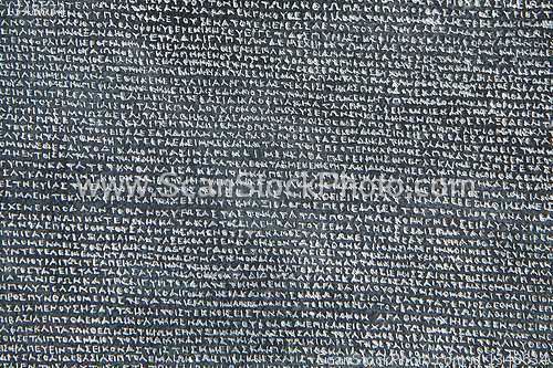 Image of old letters in the stone