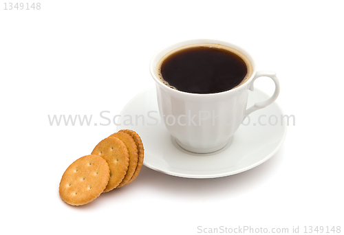 Image of White cup of coffee with crackers