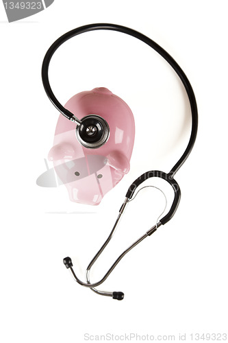 Image of Piggy Bank and Stethoscope Isolated