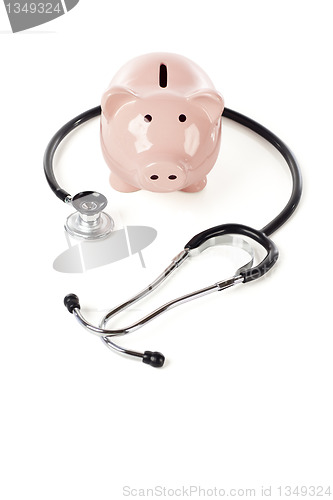 Image of Piggy Bank and Stethoscope Isolated