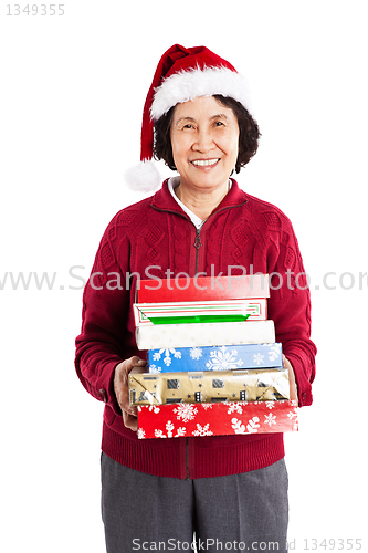 Image of Senior Asian celebrating Christmas