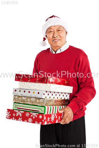 Image of Senior Asian celebrating Christmas