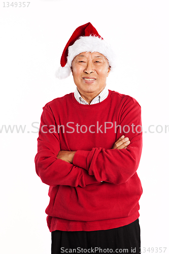 Image of Senior Asian celebrating Christmas