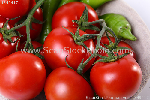Image of Close up of red tomatoes and green peperoni