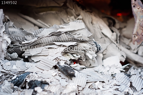 Image of Paper burning in recycle center