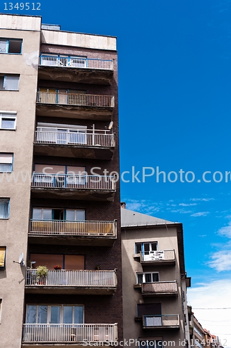 Image of Apartment building against blue sky