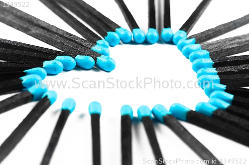 Image of Concept of love shaped with matches