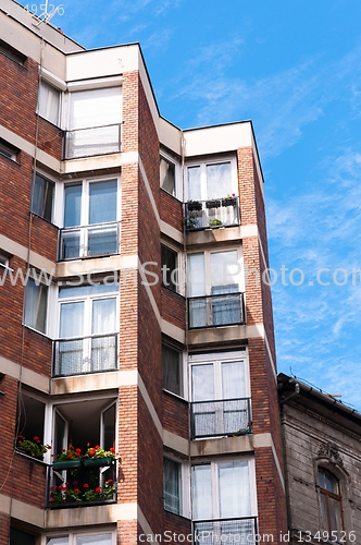 Image of Generic apartment building in Europe against blue sky